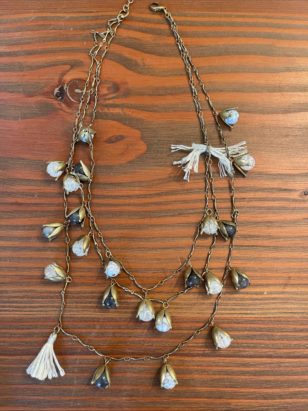 Multi-Strand Brass and Cream/Dark Blue Teardrop Necklace